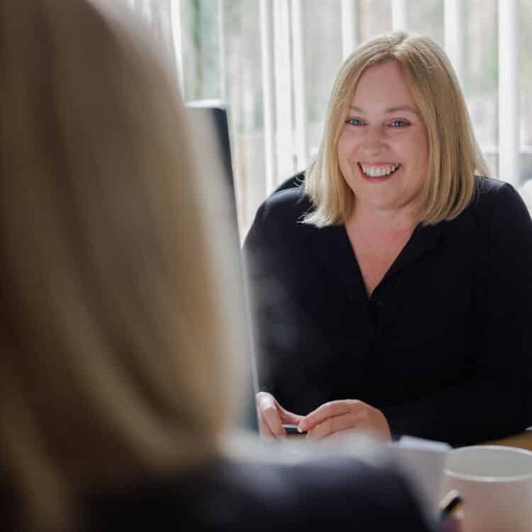 Across desk conversation